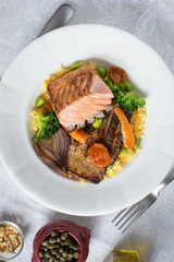 Salmon Fillets with Rice and Grilled Vegetables. Healthy Meal.
