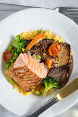 Salmon Fillets with Rice and Grilled Vegetables. Healthy Meal.