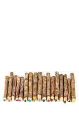 Handmade wooden color pencils on white background.