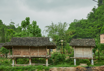 Fototapeta na wymiar house, architecture, building, wooden, home, ancient, wood, temple, roof, garden, village, sky, traditional, rural, nature, travel, landscape, asia, green, summer, cottage, hut, grass, china, tree