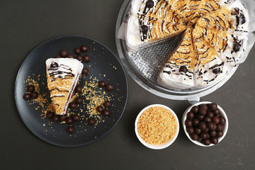 Milk and chocolate cake with chocolate ball and crispy