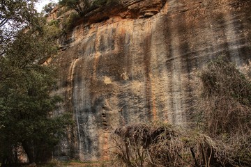 Mountain wall with colorful streaks