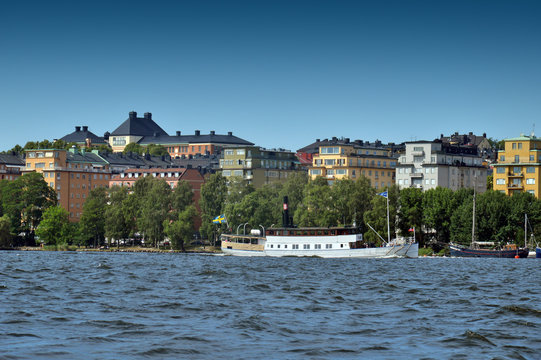 Waterside settlement full of iconic buildings at port of Kungsholmstorg brygga in Stockholm, Sweden