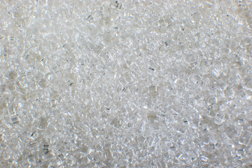 background close-up of white sugar crystals