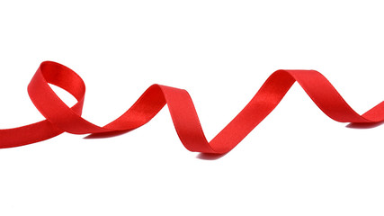 spiral of red fabric ribbon isolated on white background