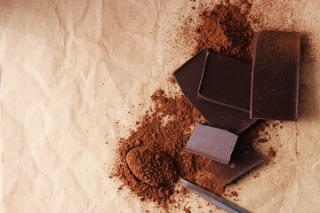 pieces of chocolate and cocoa. black chocolate.
