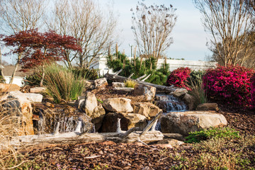 A cozy place with an artificial waterfall in the park. Spartanburg. South Carolina. USA