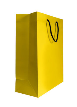 Yellow paper shopping bag isolated on white background with clipping path