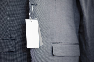 Blank label on new suit jacket close-up