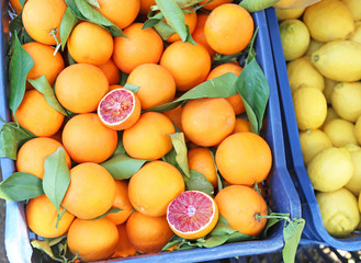 oranges at grocery shop - tarocco blood orange - sanguine orange