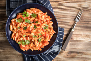 Cavatelli pasta with fresh tomato sauce.