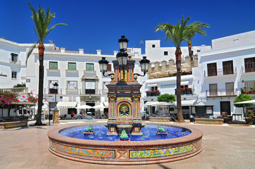 Ceramic tile water feature in the Plaza de Espana, Vejer de la Frontera, Costa de la Luz, Province of Cadiz, Andalusia. - 203579302