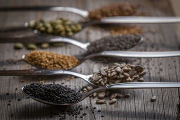Spoons with assortment of seeds