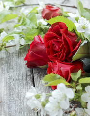 Spring bouquet on a wooden background