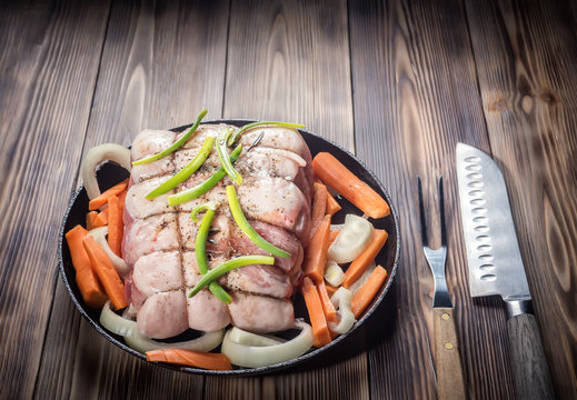 Raw pork chop marinated meat roll with assorted vegetables - Powered by Adobe