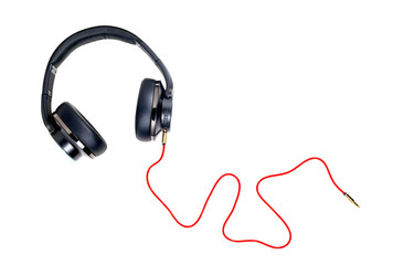 Black headphone and red cable isolate on white background.