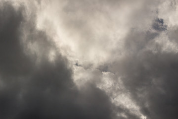 Obraz premium Stormy clouds with the sun
