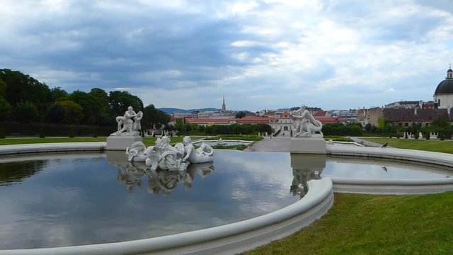 Beautiful water fountain with view over city centre (UNESCO heritage) of Vienna at Belvedere castle, Austria