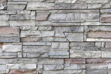 Fototapeta premium Seamless texture, background, stone lined with granite walls. Sandstone.