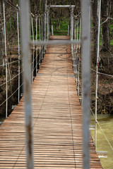 Fototapeta premium Suspended wooden bridge. the passage is closed on the bridge.