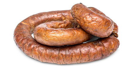 Heap of smoked sausage on white background.
