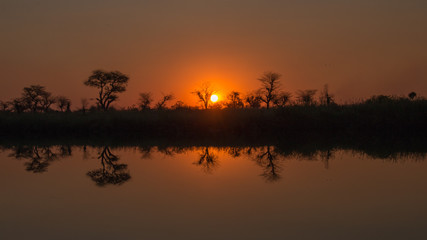 Sunset in Afrika on a river