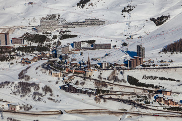 Fototapeta na wymiar Villages of Les Menuires at ski resort Val Thorens. French alps in winter