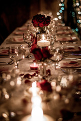 Fototapeta na wymiar Romantic Wine Glasses on Table Valentines