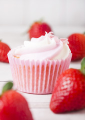Cupcake muffin with strawberry cream dessert