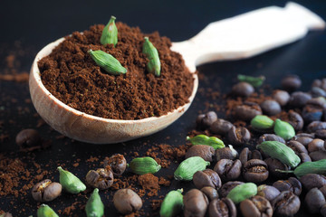 Ground black coffee and cardamom. Traditional Arabic coffee.