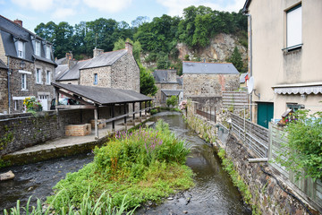 Fototapeta na wymiar View of the old stone houses and the river in Fougeres, France, Europe.