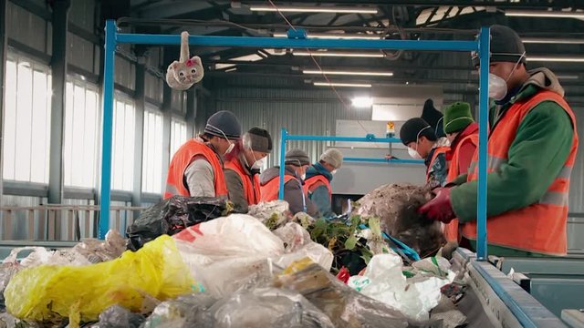 Processing of waste, garbage. Urban landfill. Sorting. Montain garbage. Ecology.