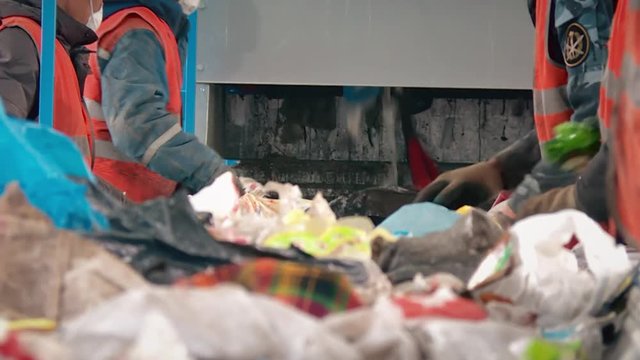 Processing of waste, garbage. Urban landfill. Sorting. Montain garbage. Ecology.
