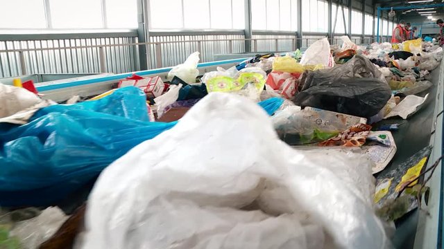 Processing of waste, garbage. Urban landfill. Sorting. Montain garbage. Ecology.