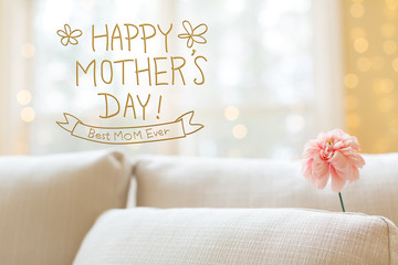 Mother's Day message with a flower in a bright interior room sofa