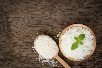 grains cooking of Thai jasmine rice or white rice in bowl on wooden Background