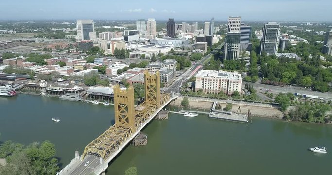 high altitude fly toward tower bridge and capital ave in sacramento california
