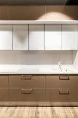 Stylish kitchen with elegant white and brown counter