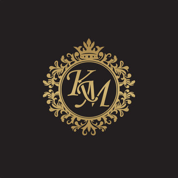Initial letter KM, overlapping monogram logo, decorative ornament badge, elegant luxury golden color