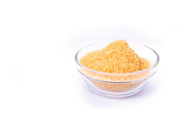 brown sugar in bowl isolated on white background