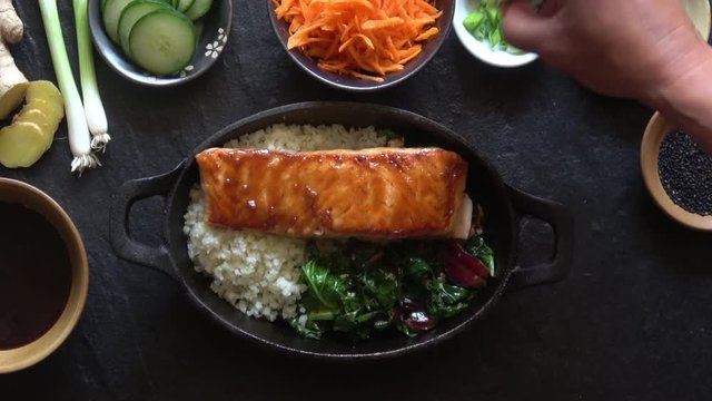 Grilled Salmon Fillet with Asparagus and Cauliflower Rice.