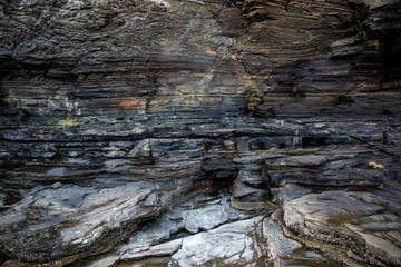 Multistory layered rough and sedimentary rocks in famous tourist site Chaeseokgang Coast in Buan-gun, South Korea.