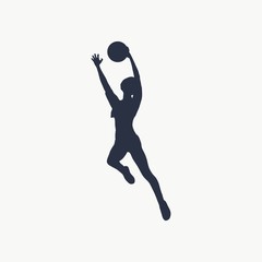 Fototapeta na wymiar Basketball player. Girl jumping and catching the ball