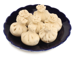 Khinkali, a georgian dumpling, on a white background