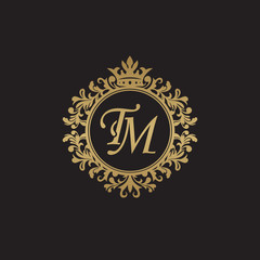 Initial letter TM, overlapping monogram logo, decorative ornament badge, elegant luxury golden color