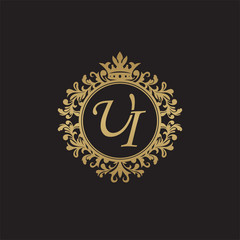 Initial letter UI, overlapping monogram logo, decorative ornament badge, elegant luxury golden color