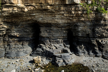 Multistory layered rough and sedimentary rocks in famous tourist site Chaeseokgang Coast in Buan-gun, South Korea.