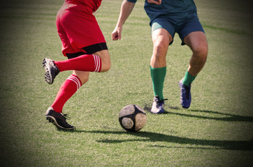 Fototapeta premium soccer players dribbling vignette effect