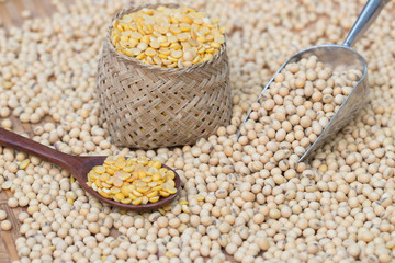 soy beans in bammboo basket  on wood background.