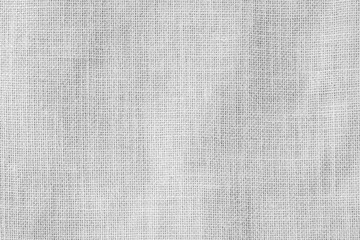 Fototapeta na wymiar Hessian sackcloth woven texture pattern background in light white gray color